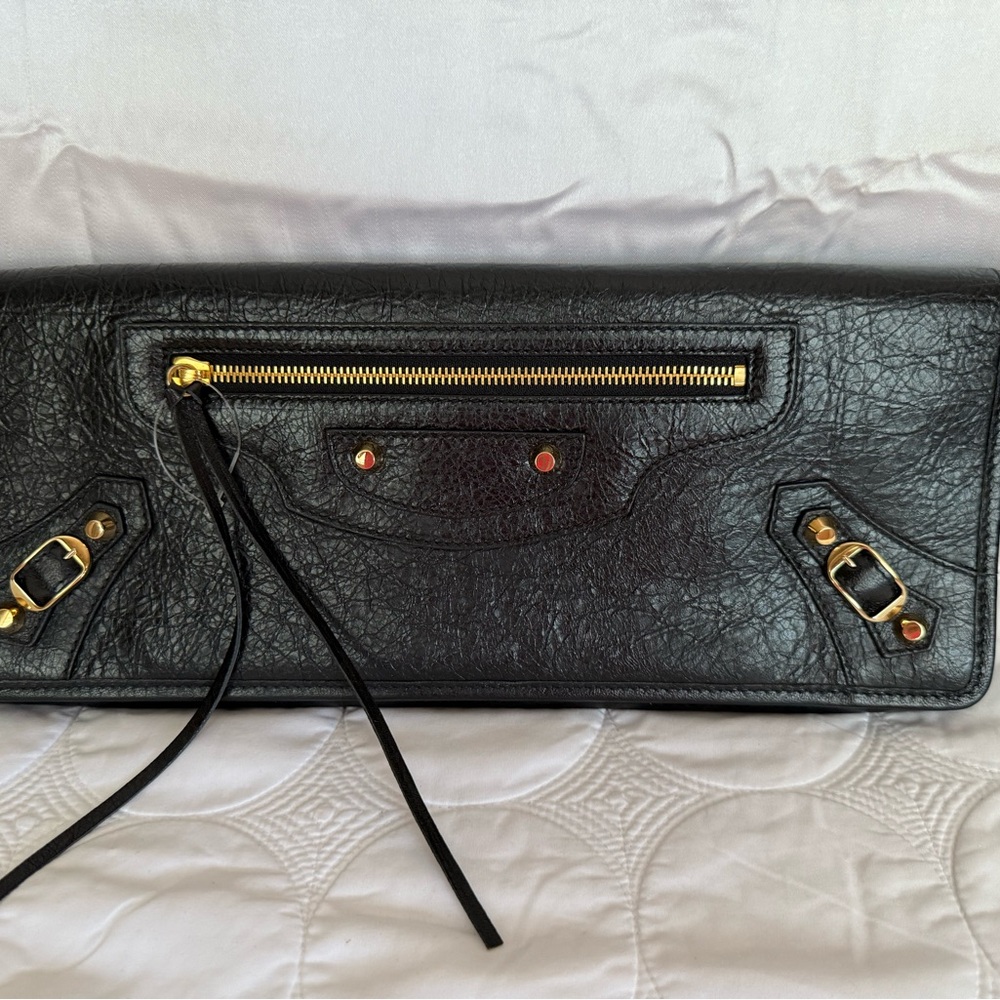 Balenciaga Black Leather Clutch Giant in  also called “Arena”gold-tone hardware.